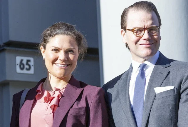 Crown Princess Victoria wore a burgundy Sasha wool suit blazer from Filippa K, and a pink Xilla ruffled silk blouse from Rodebjer