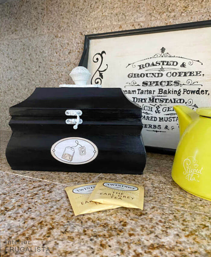 How to upcycle an old wooden jewelry box into a small tea storage box pretty enough to display at a beverage station or the kitchen counter.