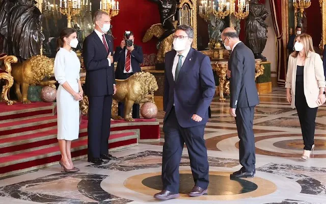 Infanta Sofia wore an embroidered eco-friendly viscose dress by Claudie Pierlot. Queen Letizia wore a light blue dress