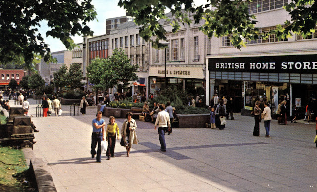 People walking along Kirkgate in the 1970s, with BHS and Marks and Spencer on the right hand side