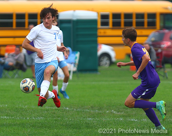 Brennan Haake pushes the ball across the field