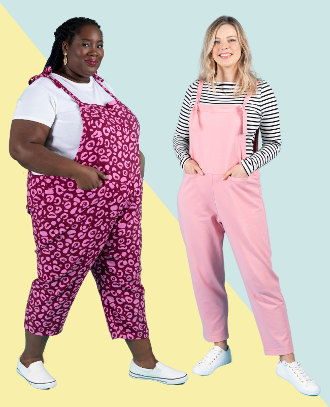Erin dungarees or overalls sewing pattern on two models - black plus size model wears pink leopard print dungarees, blonde model wears pink French terry dungarees