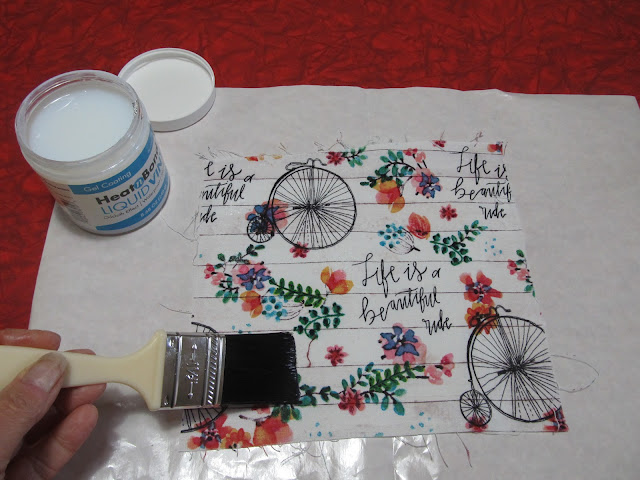 Painting Liquid Vinyl on Bicycle print fabric