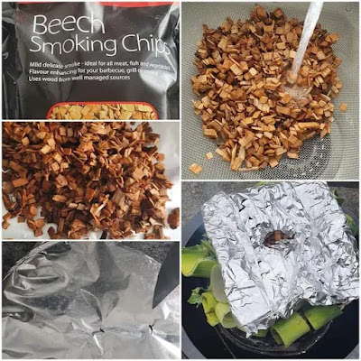 I wet my wood chips with water then wrap in aluminum foil and poke holes in the aluminum foil with a knife. Poking holes in the foil helps in the slow release of the smoke.