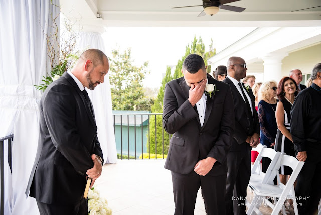 groom crying at altar