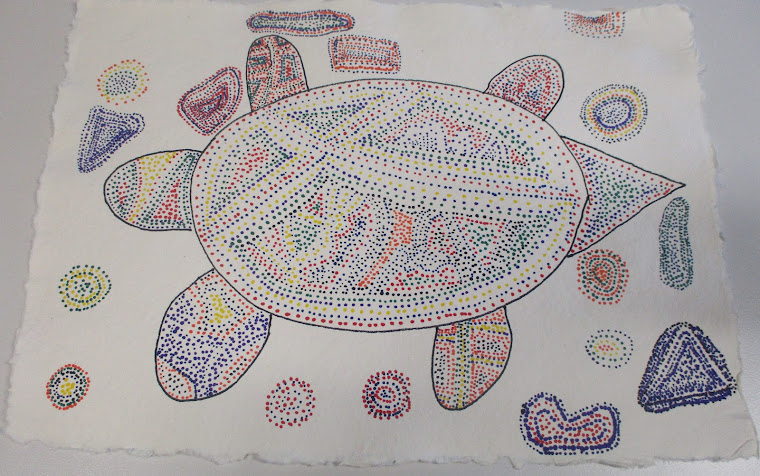 Our dot-style paintings of a turtle were fun to design.