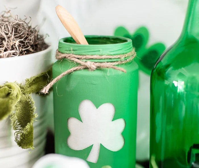 green painted shamrock jar