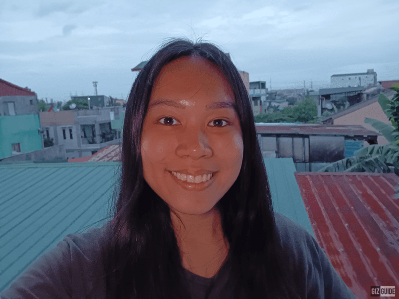 Gloomy outdoor selfie with screen flash