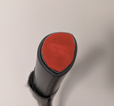 Red tape covering one of the neck light LEDs.