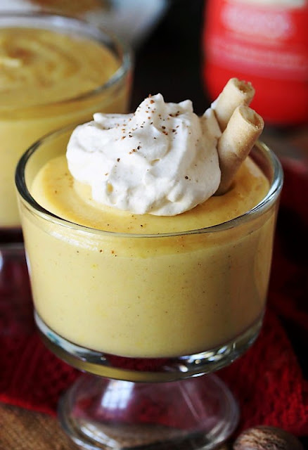 Eggnog Whipped Cream On Top of a Bowl of Pudding Image