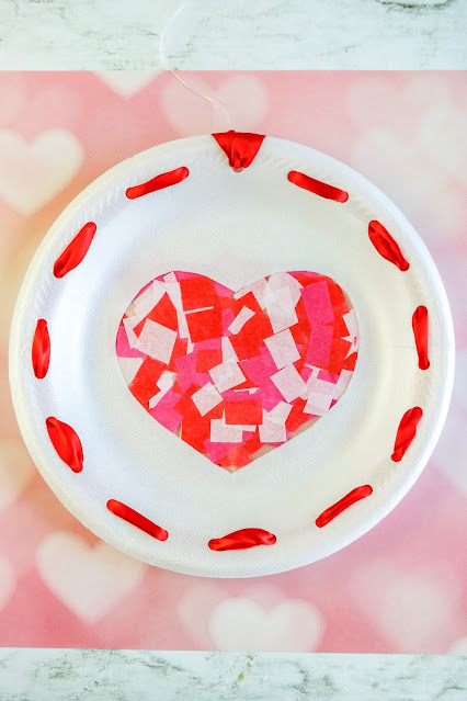 sun catcher on a pink background.