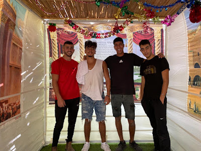 Cadets of the Academy building Sukkot for the elderly (Elad far left)