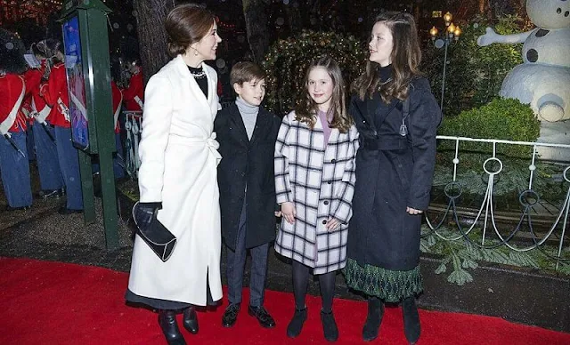 Princess Mary in Oscar de la Renta. Princess Isabella in Hugo Boss cetiva coat and Baum und Pferdgarten cyrila skirt. Designers Remix coat