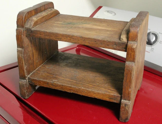 Photo of an antique footstool.