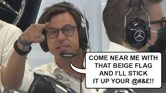 Toto Wolff pointing aggressively and saying "come near me with that beige flag and i’ll stick it up your @#&£!!"