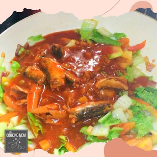 adding sardines in can to Misua Noodles with Sardines