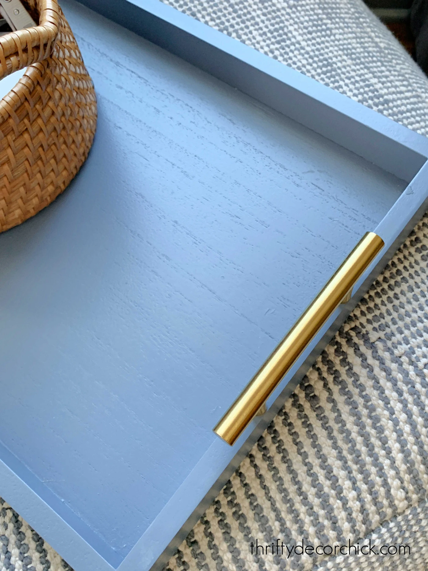 blue tray with brass handles