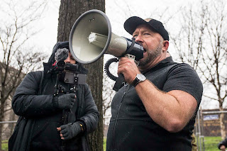 Alex Jones, owner of the conspiracy theory site Infowars, is among the public figures who have denied the Sandy Hook shootings. Zach Gibson/Getty Images