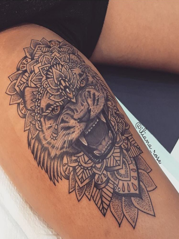 Lion thigh tattoo design over women