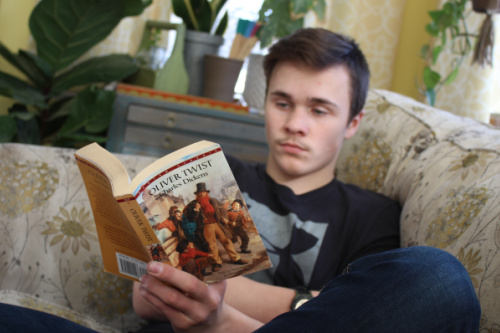 Teen reading a classic novel