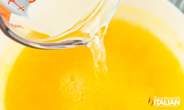adding water for tequila jello shots with orange juice