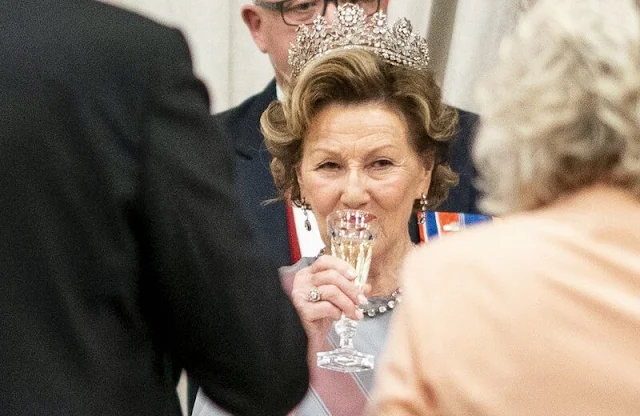 For the Parliament gala dinner, Crown Princess Mette-Marit wore a gown by Emilio Pucci. King Harald and Queen Sonja