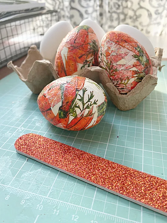 decoupaged eggs and emery board