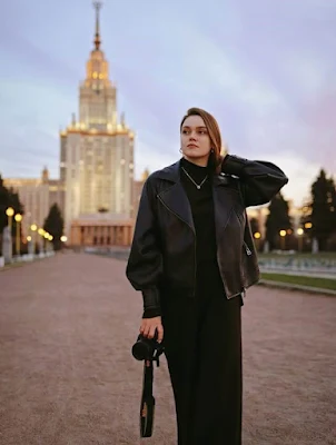 A Modern Girl Wearing Black Leather Jacket