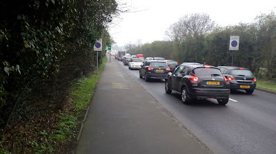 A dual carriageway with stationary cars