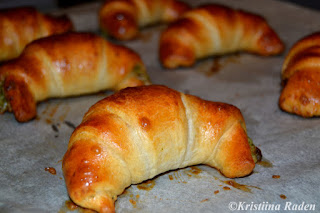 Croissants with pesto and cheese