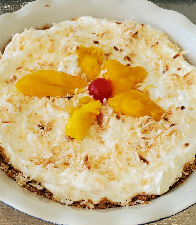 delicious no bake sweetened condensed milk pie with mango and toasted coconut