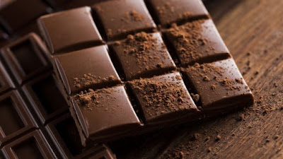 Dark chocolate is made with cocoa butter rather than fats like palm or coconut oils, and is frequently referred to as "bittersweet" or "semisweet."