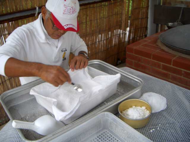 Salt cleaning by hand.