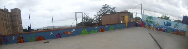 Pintura mural infantil en parking de Escola Pia