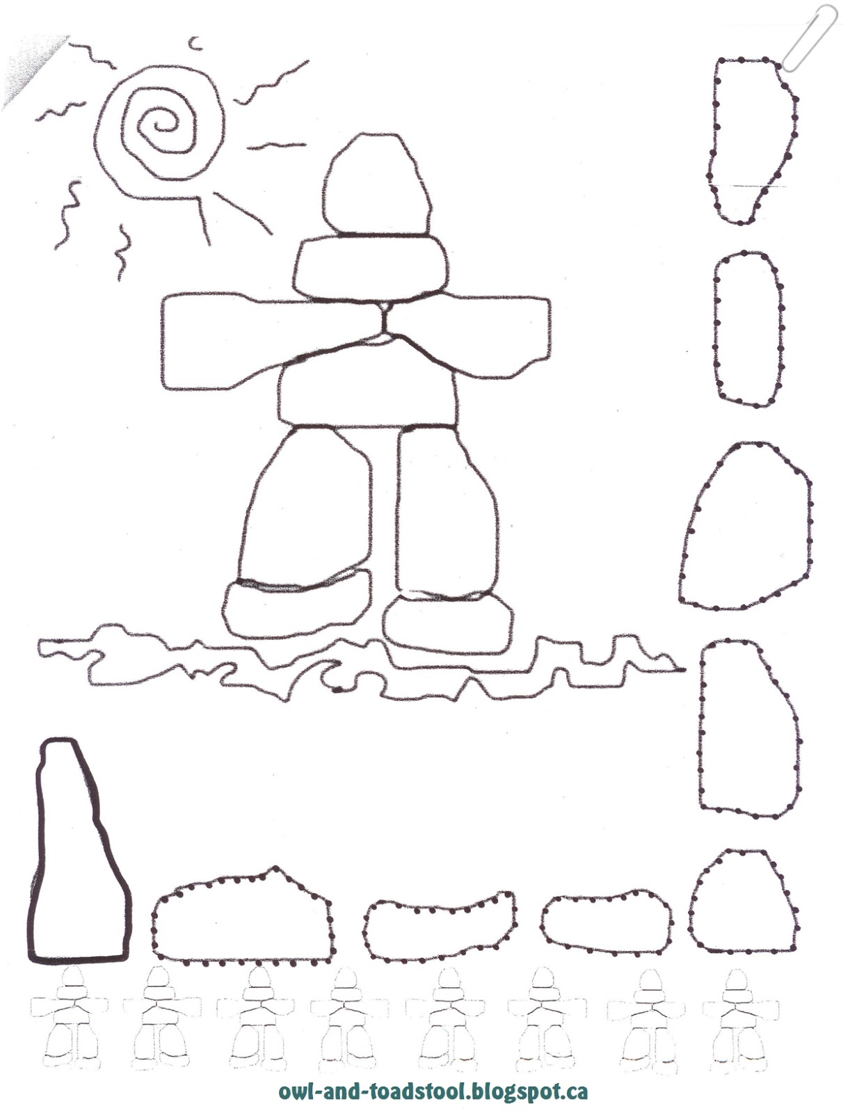 paper puzzle that forms into an Inuksuk {I've seen it spelled Inuksuk ...
