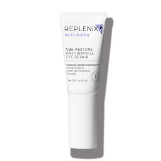 Detailed view of Replenix Age Restore Anti-Wrinkle Eye Repair. This eye cream is in a small white container with blue labeling, conveying a sense of refined skincare. It's positioned gracefully on a simple backdrop, emphasizing its targeted eye care benefits.