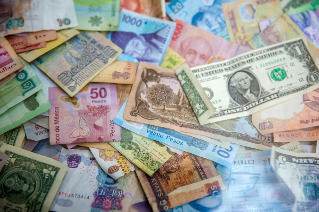 assorted currency notes:Photo by Jason Leung on Unsplash