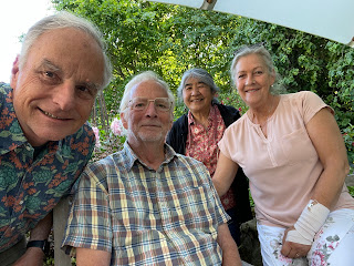 Me, Bill, Carol and Bente outside on Bill and Bente's garden patio