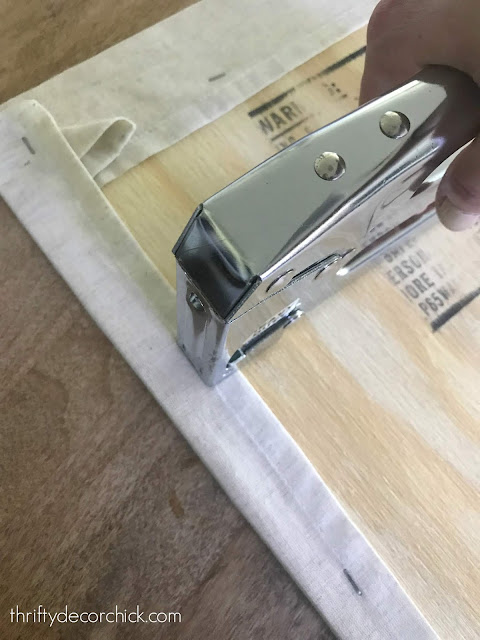 How to staple fabric around wood