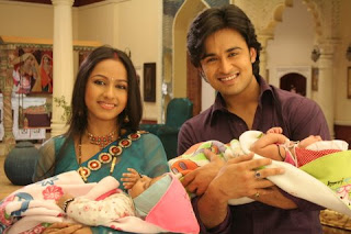 Shree and Hari on the Zee TV show with their apparent newborns