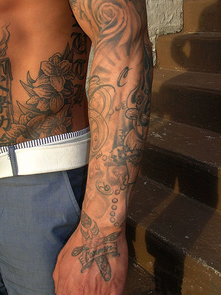 tribal half sleeve tattoos. sleeve tattoo ideas for men.