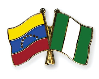 Flag pins of Venezuela and Nigeria