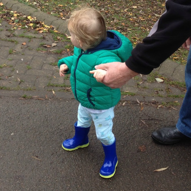 toddler in park wearing his wonderful wellies