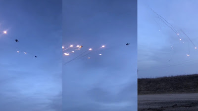 SU-34 and SU-25SM fighter jets fire hot smoke lifts over Donetsk