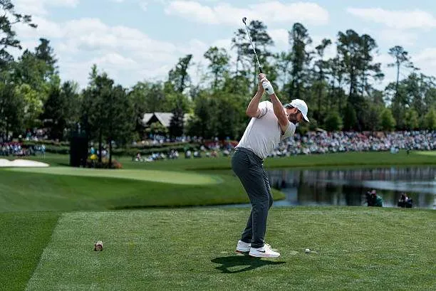 Masters champion Scottie Scheffler of the United States tees off from the fourth hole during the Par 3 Contest ahead of the 2025 Masters Tournament at Augusta National Golf Club on Wednesday, April 9, 2025. Photo by Shanna Lockwood/Getty Images
