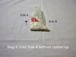 Step 9. Fold Side A bottom corner up.