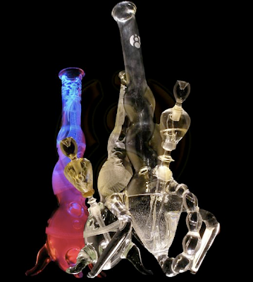  of beautifully etched and shaped glass water pipes like the following: