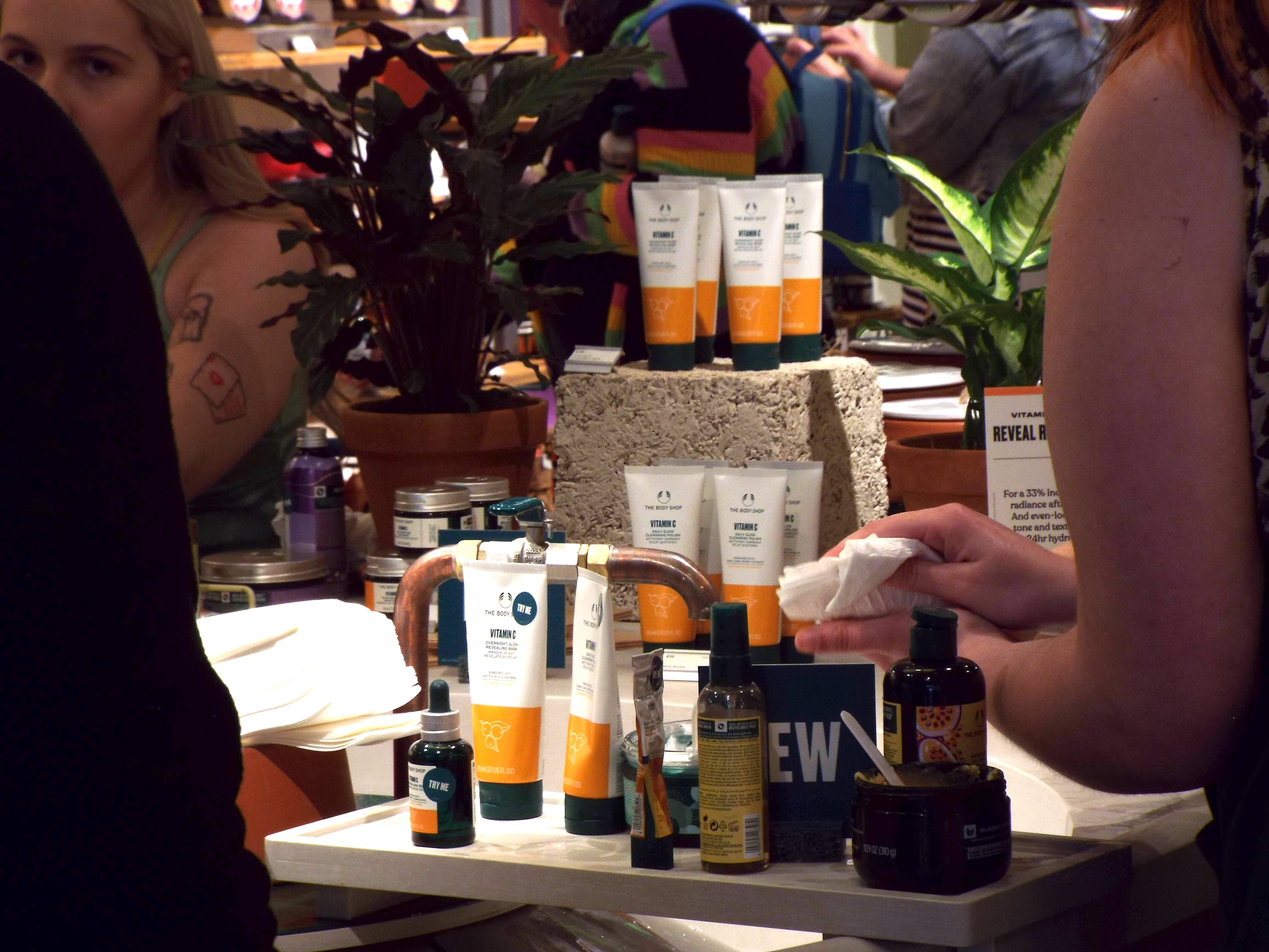 All action around the product testing island, with people getting their hand massages and an array of the vitamin C products on display in the centre.