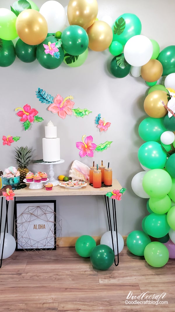 Balloon garlands are a great way to fill a big space!     Here's a post all about balloon garlands for all the details!