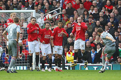 Fabio Aurelio of Liverpool scores his team's third goal. Liverpool won the tie 4-1.